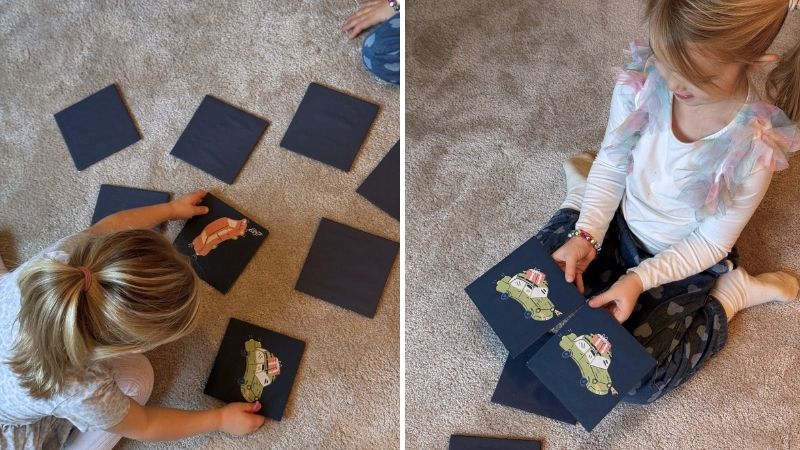 barn som spelar jättememo med bilar